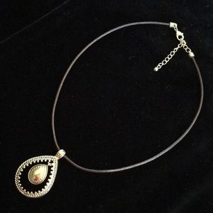 Pendant necklace with leather chain